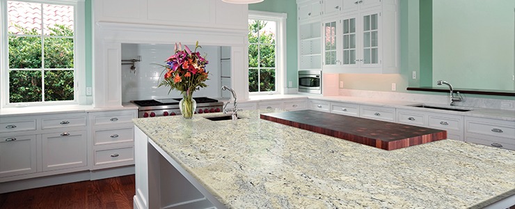 Close-up of a light-colored kitchen countertop showcasing its smooth finish and subtle texture. By Florida Design Works