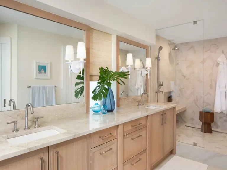 Luxurious Seaside Sanctuary bathroom design by Charles Design Studio in Naples, showcasing a tranquil and modern coastal-inspired remodel by Florida Design Works.